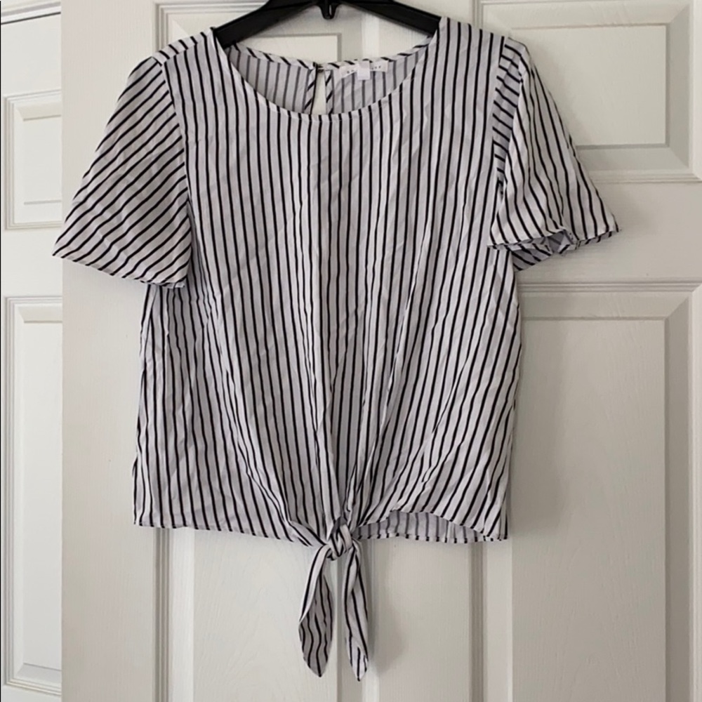 NWT Women’s socialite brand blouse size XS.